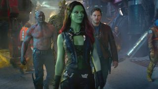 From left, Dave Bautista as Drax, Groot (voiced by Vin Diesel), Zoe Saldana as Gamora, and Chris Pratt as Peter Quill in "Guardians of the Galaxy."