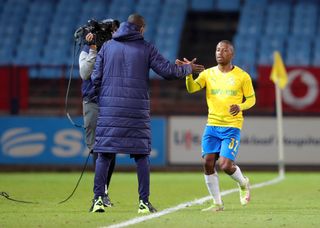 Thabiso Kutumela celebrates his goal with Rhulani Mokwena