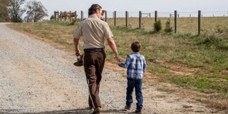 Rick and little Carl in The Walking Dead.