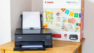 Canon PIXMA TS6420a Wireless All-In-One Inkjet Printer being tested in writer's home