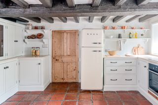 Kitchen with fridge in period home