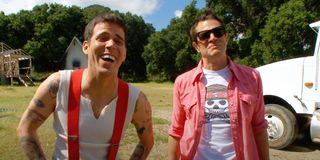 Steve-O laughing and hanging out with Johnny Knoxville on the set of Jackass