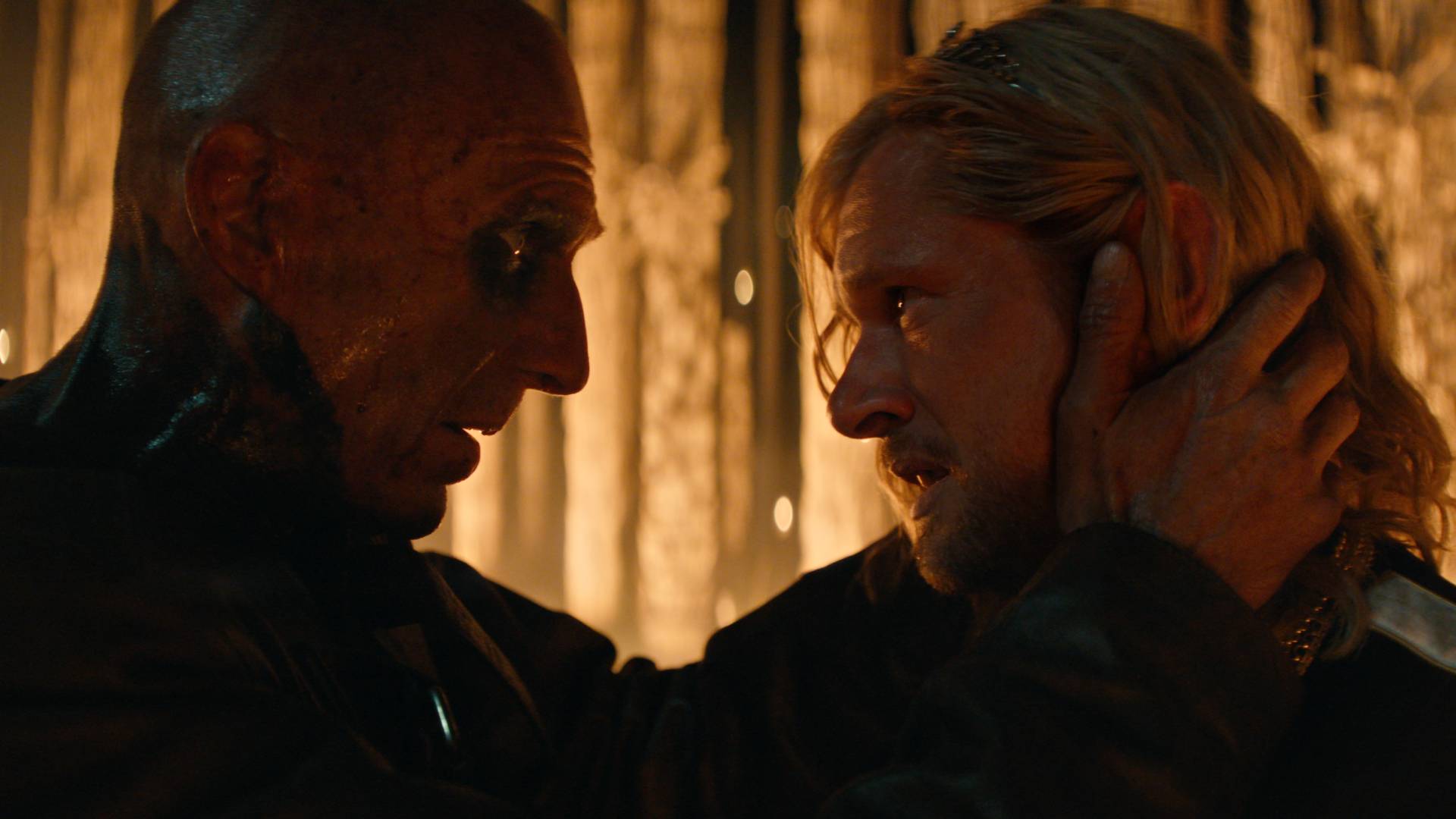 Ralph Fiennes as Dr. Kelson and Jack O'Connell as Jimmy Crystal in 28 Years Later: The Bone Temple