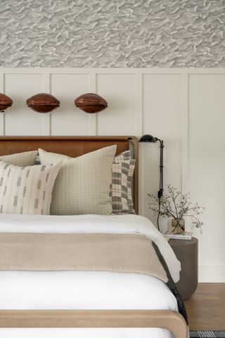 bed with leather headboard in light off white scheme