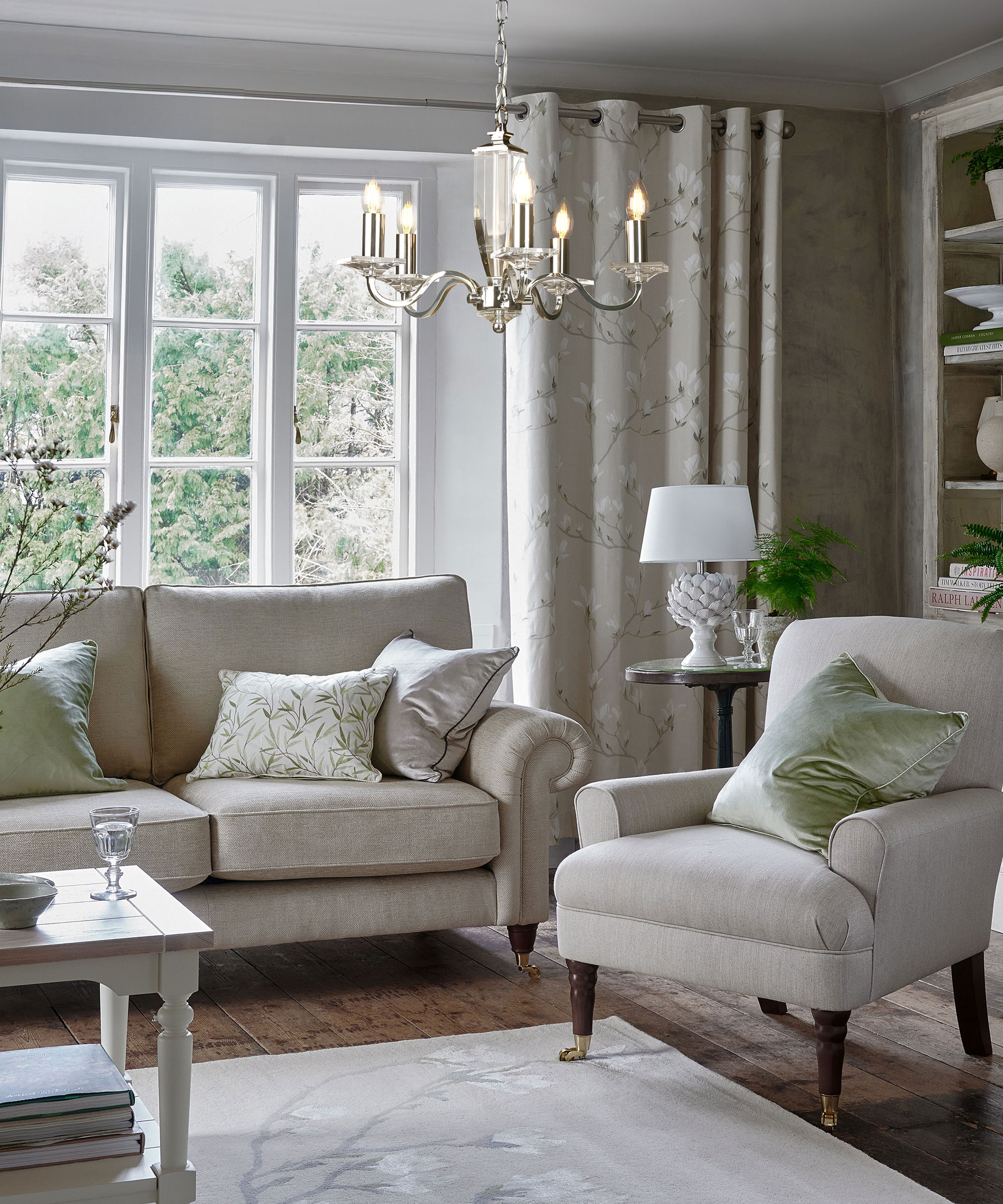 neutral living room with chandelier