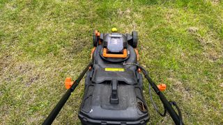 Worx WG743 POWER SHARE 40-Volt 17 in. Cordless Mower being tested in writer's home