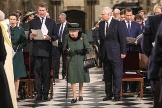 Queen Elizabeth II arrives in Westminster Abbey accompanied by Prince Andrew, Duke of York for the Service Of Thanksgiving