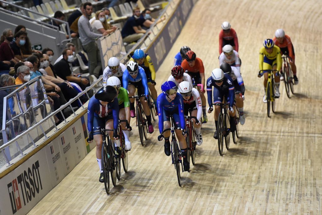 Riders compete in the womens Scratch Race during the UCI Track Cycling World Championships at JeanStablinski velodrome in Roubaix northern France on October 20 2021 Photo by FRANCOIS LO PRESTI AFP Photo by FRANCOIS LO PRESTIAFP via Getty Images