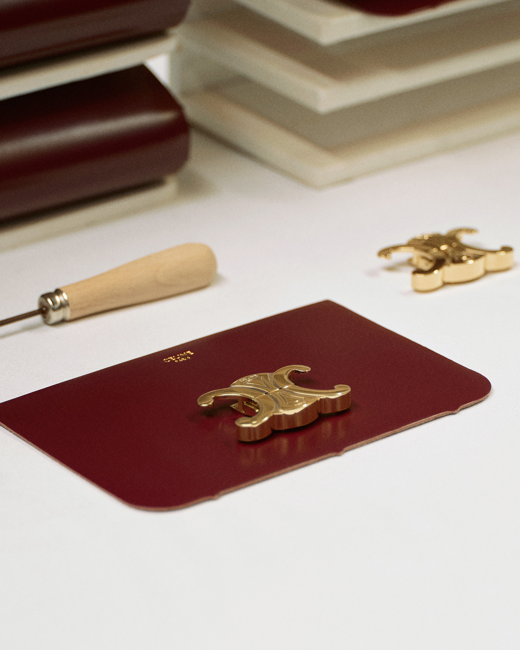 a Celine wallet being created