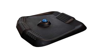 A black anti-fatigue mat with a blue ball in the middle of it