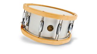 That's brushed aluminium and the drum's chunky hoops are 13-ply rock maple