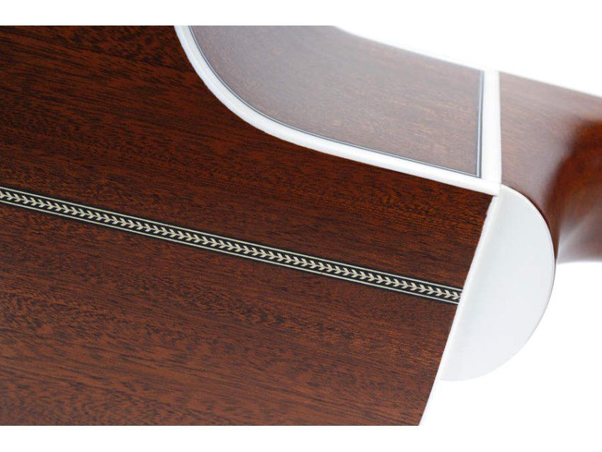 The Canadian mahogany back and sides are beautifully finished