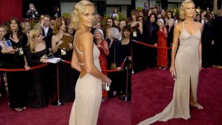 Charlize theron wearing a white beaded dress on the red carpet