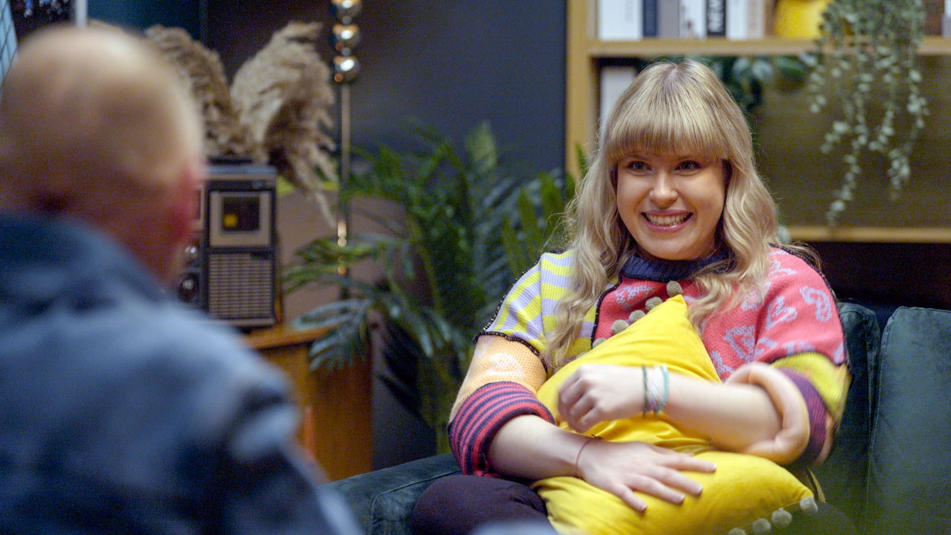 Nicole clutches a cushion as she meets with Owen.