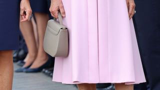 Queen Camilla's handbag during a ceremonial welcome at The Arc De Triomphe