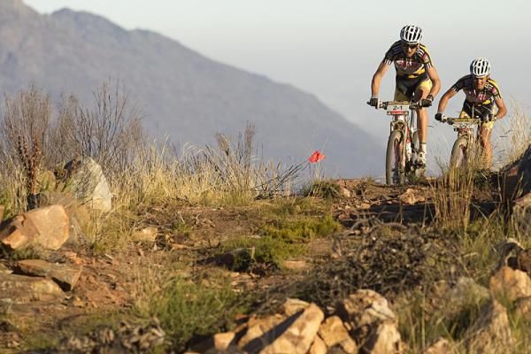 Christoph Sauser and Burry Stander of team36One Songo_Specialized head for victory during stage 2
