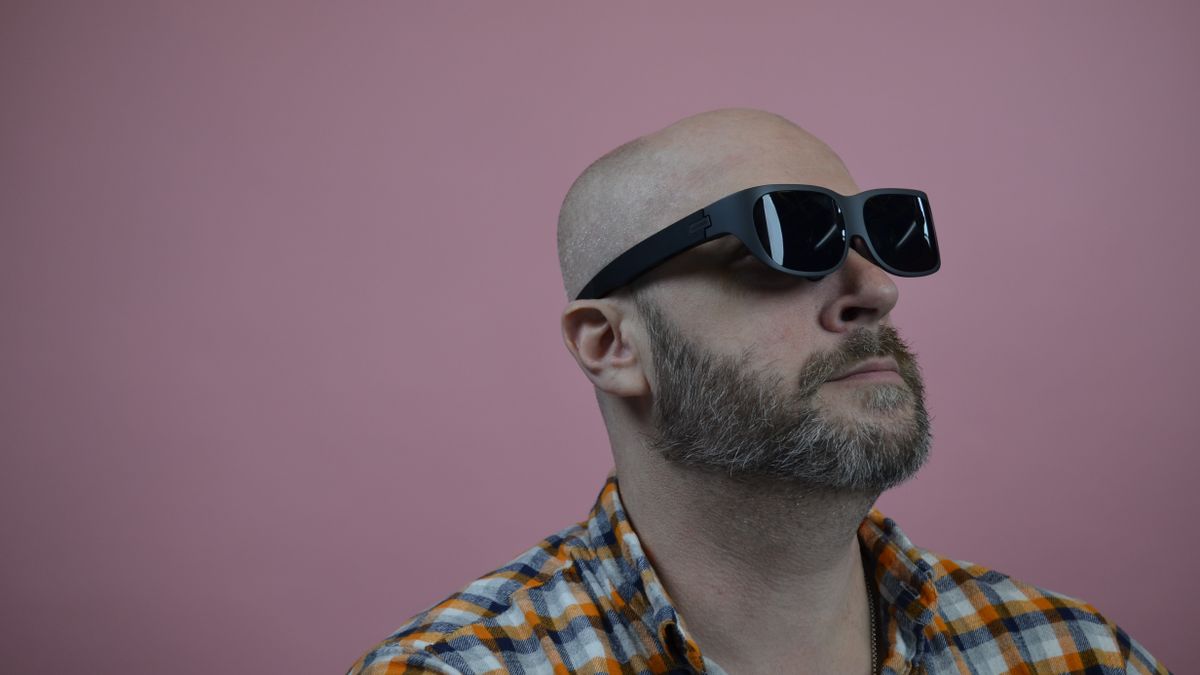 Editor John Loeffler wearing Lenovo Legion Glasses