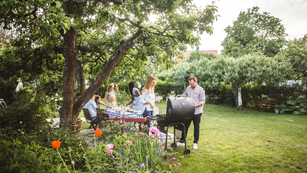 People enjoying an outdoor barbecue