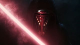 A close up of Darth Revan behind a red lightsaber