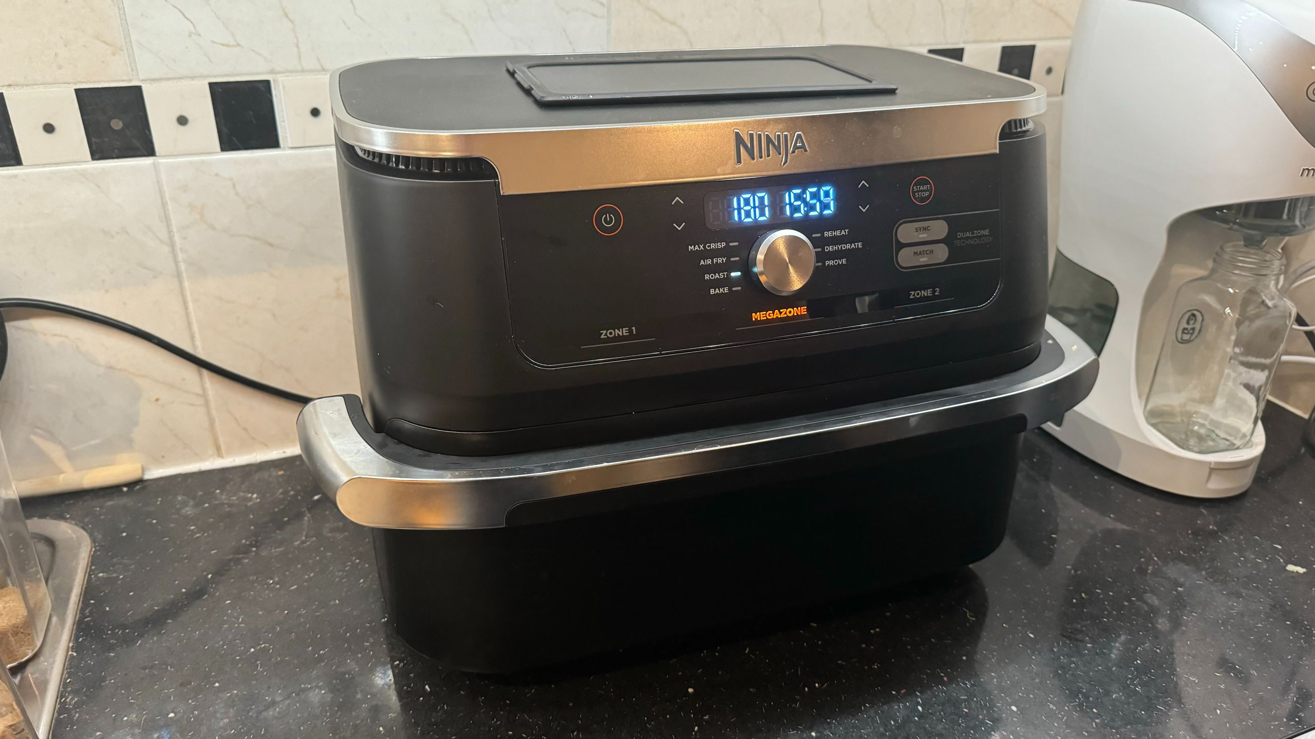 The 4.5-star Ninja air fryer just dropped to its lowest price this year on Amazon — 'a delightfully easy machine to use that delivers consistent, fantastic results'