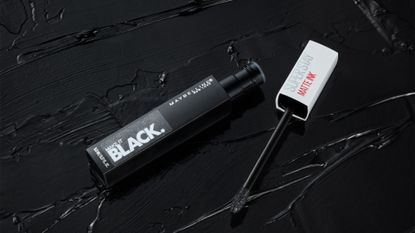 Maybelline Super Shine Lipstick in black packaging 