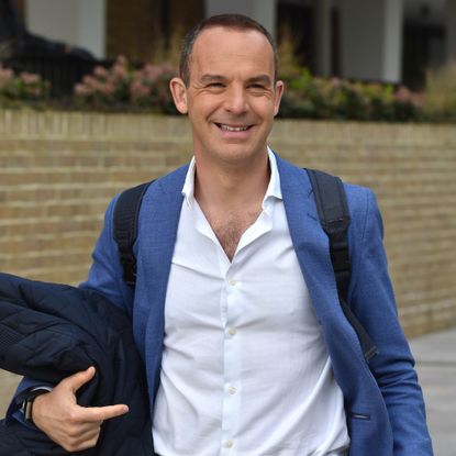 Martin Lewis in white shirt and blue jacket