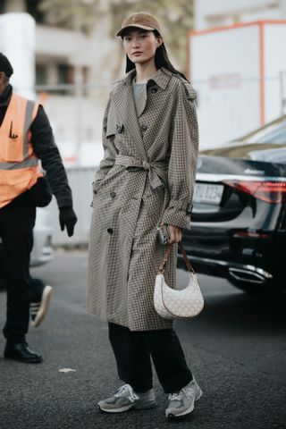 woman wearing suede sneakers.