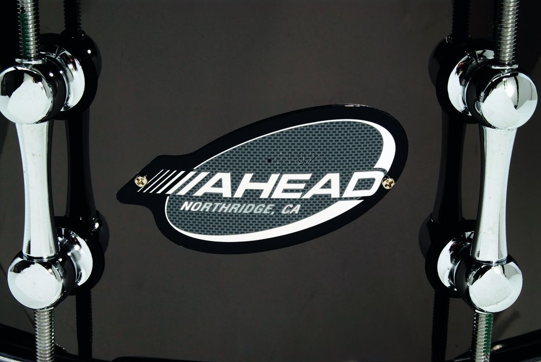 Each drum is constructed from a thin, unbeaded brass shell.