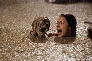 JoBeth Williams screams next to a skeleton in 'Poltergeist'