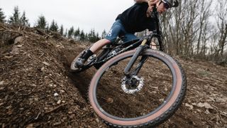 Hutchinson Kraken tires being ridden round a berm