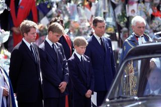Funeral of Diana, Princess of Wales - L-R Earl Spencer Prince Charles Prince William Harry and Prince Charles stand alongside the hearse containing the coffin of Diana after the funeral service at Westminster Abbey.