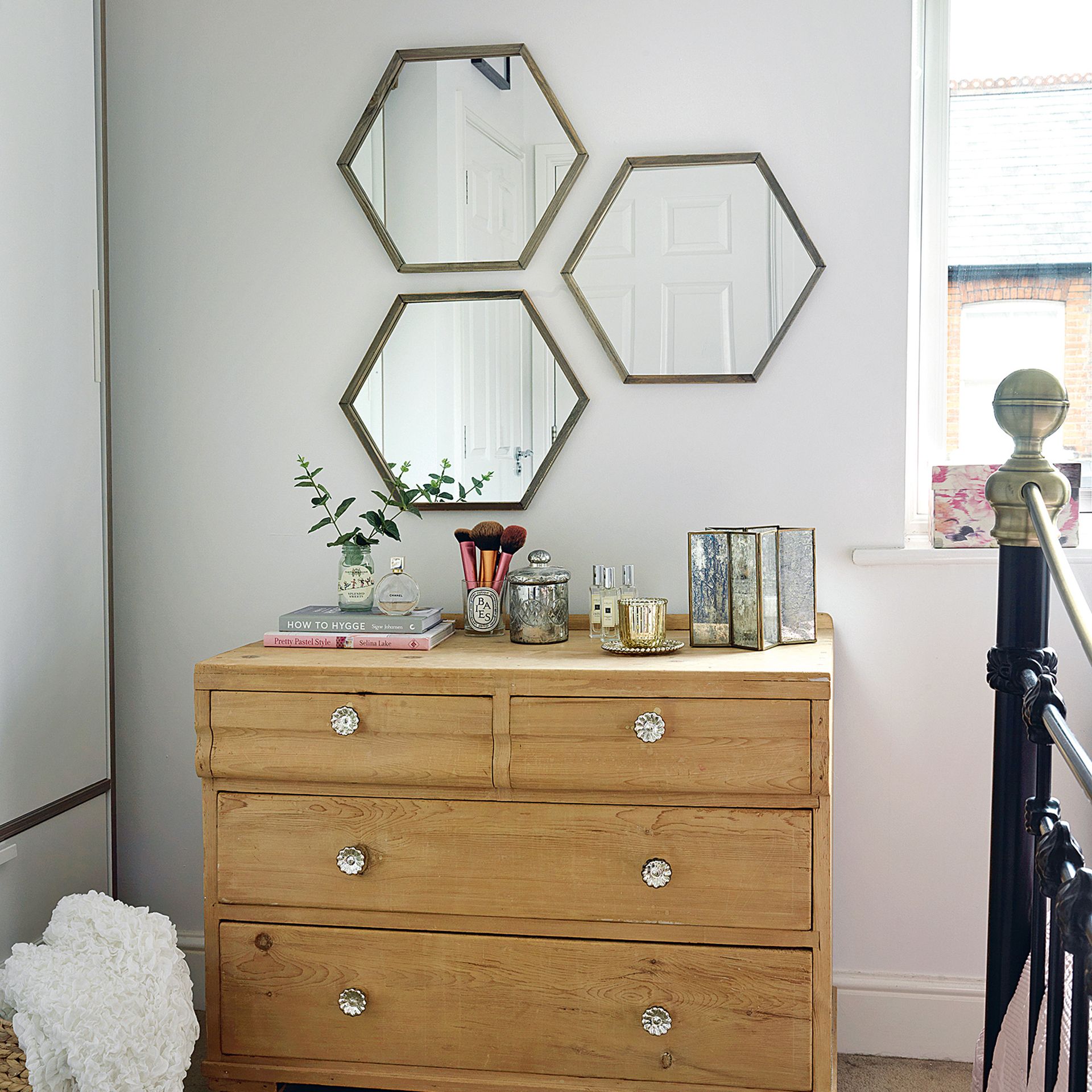 Bedroom with mirror gallery walll