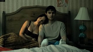Inde Navarrette as Nikki and Michael Johnston as Bear in Obsession