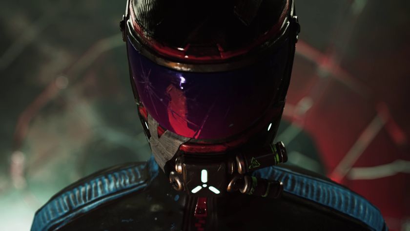 A driver in a black outfit stares down the camera