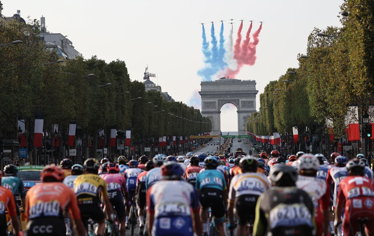 TOPSHOT French air forces aerobatics demonstration unit Patrouille de France PAF performs as the pack rides on the Champs Elysees avenue with the Arc de Triomphe in the background during the 21st and last stage of the 107th edition of the Tour de France cycling race 122 km between ManteslaJolie and Champs Elysees Paris on September 20 2020 Photo by KENZO TRIBOUILLARD AFP Photo by KENZO TRIBOUILLARDAFP via Getty Images