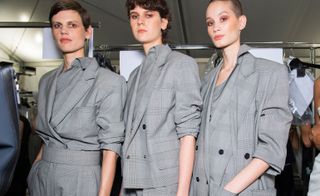 Models wear grey blazers, dress and top