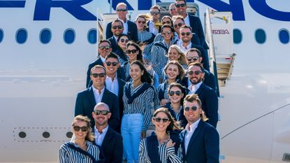The Ryder Cup team photo on the steps of the plane