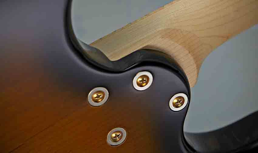 The sculpted neck heel offers access, and the extended tenon join adds stability