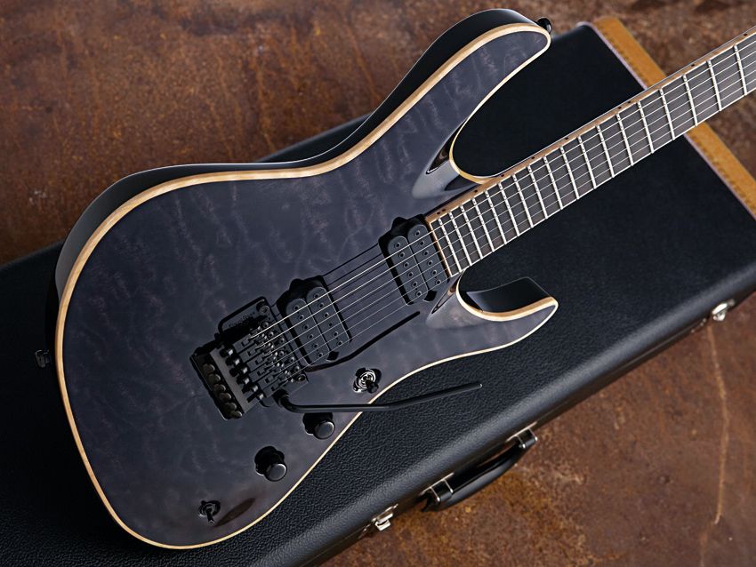 You'll have to be strong to heft the mahogany/maple body of the Jackson Chris Broderick Soloist 6.