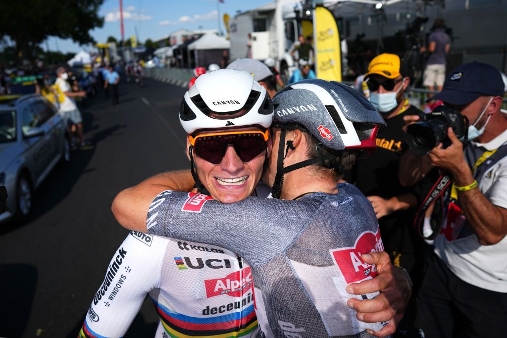 NIMES FRANCE JULY 16 LR Mathieu van der Poel of Netherlands and stage winner Jasper Philipsen of Belgium and Team Alpecin Deceuninck react after the 111th Tour de France 2024 Stage 16 a 1886km stage from Gruissan to Nimes UCIWT on July 16 2024 in Nimes France Photo by Daniel Cole PoolGetty Images
