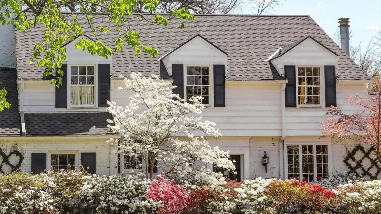 A suburban home photographed on a sunny spring day