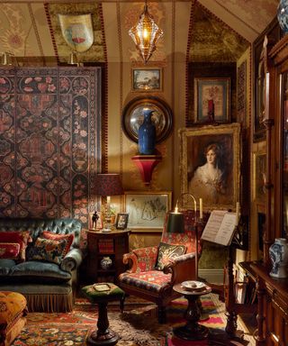 Living room full of gothic style things and dark colors