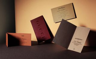 Desert hues of terracotta, sand and burgundy blew across a variety of Milan Fashion Week invitations