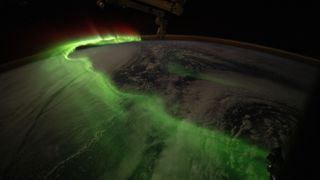 iss074e0672727 (June 5, 2026) ---The aurora australis arcs over Earth during an active solar event in this photograph taken at approximately 11:32 p.m. local time from the International Space Station as it orbited 271 miles above the Indian Ocean southwest of Perth, Australia. Credit: NASA/Jessica Meir