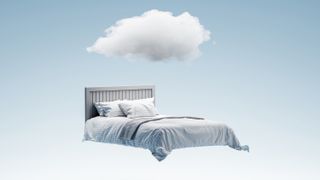 Image shows a mattress floating under a white cloud on a blue background