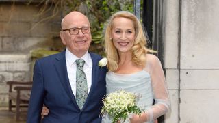 Murdoch and Hall on their wedding day