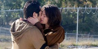 Glenn and Maggie kissing after she says yes in The Walking Dead.