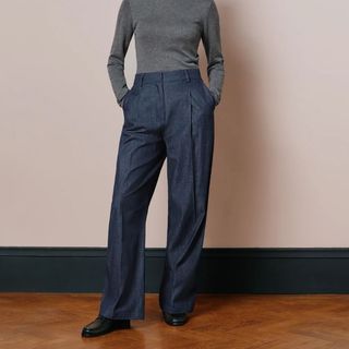 Cropped image of woman wearing tailored trousers