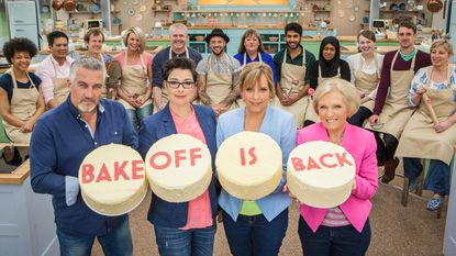 group of chefs with cakes 