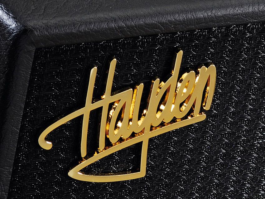 The petite's simple black grille cloth is adorned with the shiny gold Hayden logo.